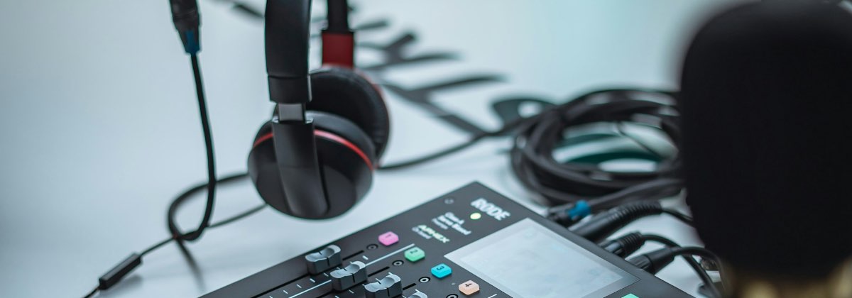 Content creator recording a podcast with a studio condenser microphone