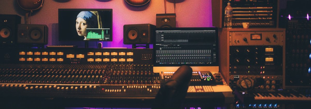 Mixing console with pan controls for placing sounds between left and right