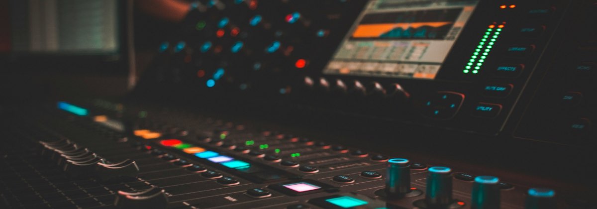 Music producer changing the pitch of a vocal track in audio software